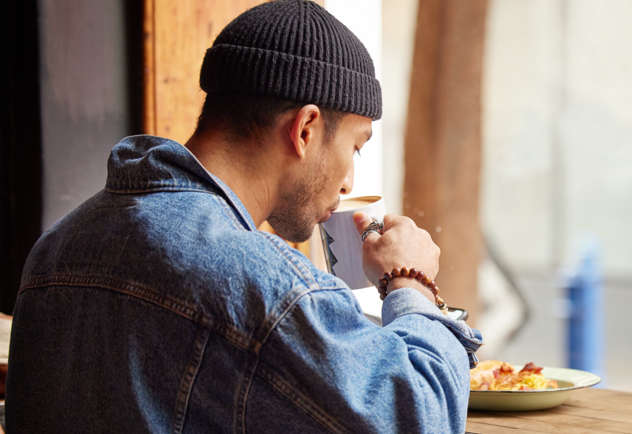 man drinking coffee